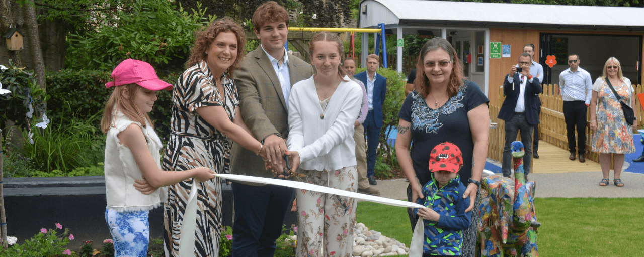 Lucie, Hannah Ingram-Moore, Benji, Georgia, Finley and Michaela cut the ribbon on the garden