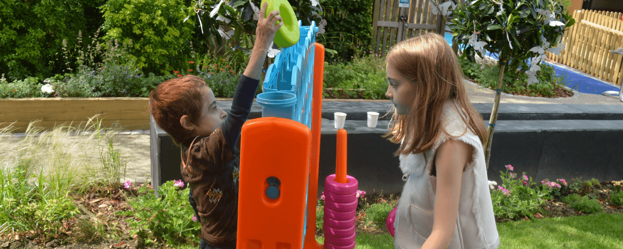 Finley and Lucie playing in the garden