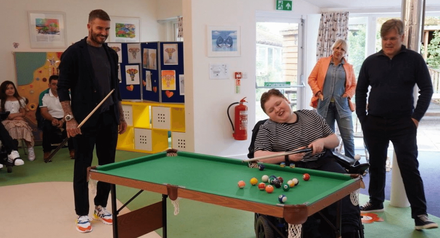David Beckham with Jasper playing pool