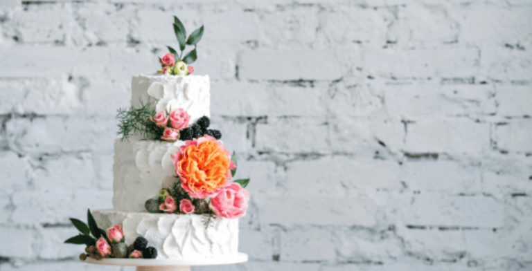 Wedding cake with colourful flowers