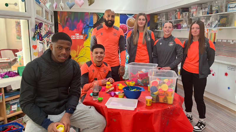Oxford City FC Oxford City FC players visiting Hospice play area