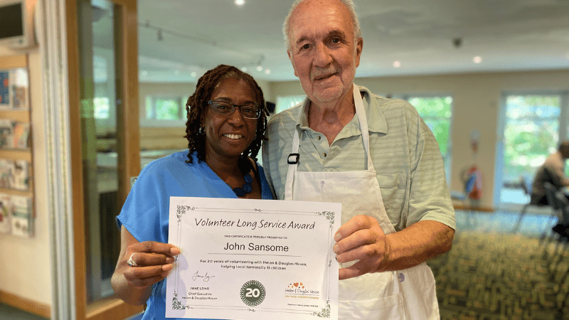 Website body images (3) John with his 20 year service certificate