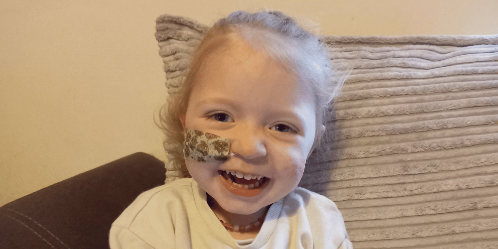 A photo of a little girl smiling