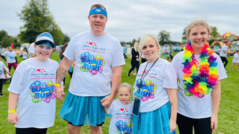 Chris hiking up a mountain in the snow