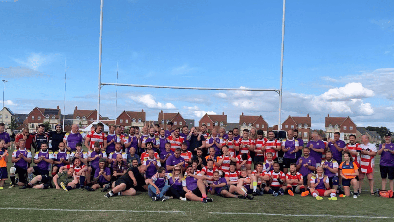 Chris hiking up a mountain in the snow