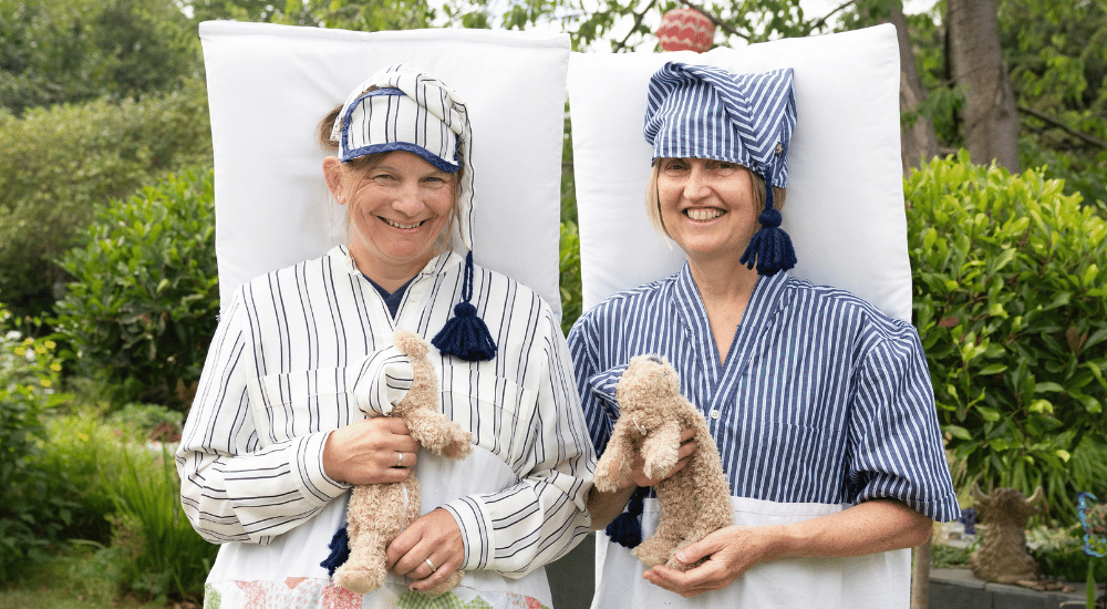 Oxford Half team webpage Two women dressed as beds